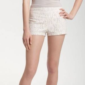 Salmon and white lace shorts